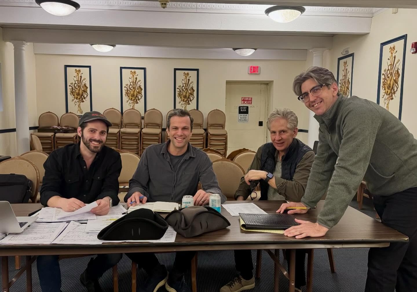 The Rebel Town creative team in a production meeting